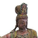 Carved Buddhist sculpture leads art and antique timepieces auction