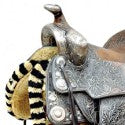 Silver saddle rides into Superbowl Sunday art and antiques sale