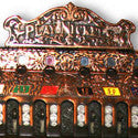 Caille upright slot machine leads antique mechanical collectibles at auction