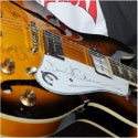 Bonhams auctions charity PUP AID guitar signed by Page, Richards and Daltrey