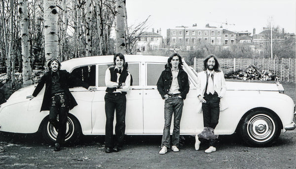 The Beatles with white Rolls Royce