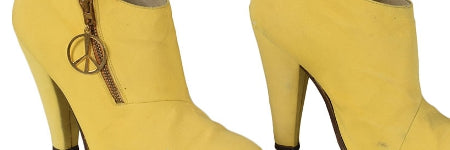 Prince's yellow boots smash estimate at star's memorabilia sale