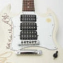 Hank Marvin's signed guitar rocks auction for Cancer Research UK
