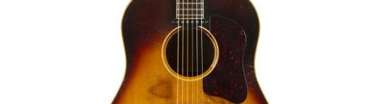John Lennon's stolen guitar sets new record for Beatles memorabilia