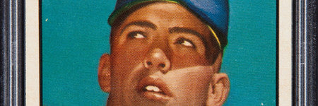 Topps Mickey Mantle baseball card leads sports memorabilia auction