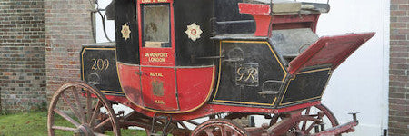 Antique Royal Mail coach offered at Bonhams