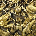 Gold-plated dragon snuff bottle auctions for $965,000