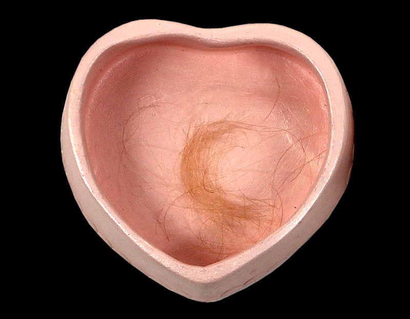 A heart shaped box containing a lock of hair from the Nirvana frontman Kurt Cobain